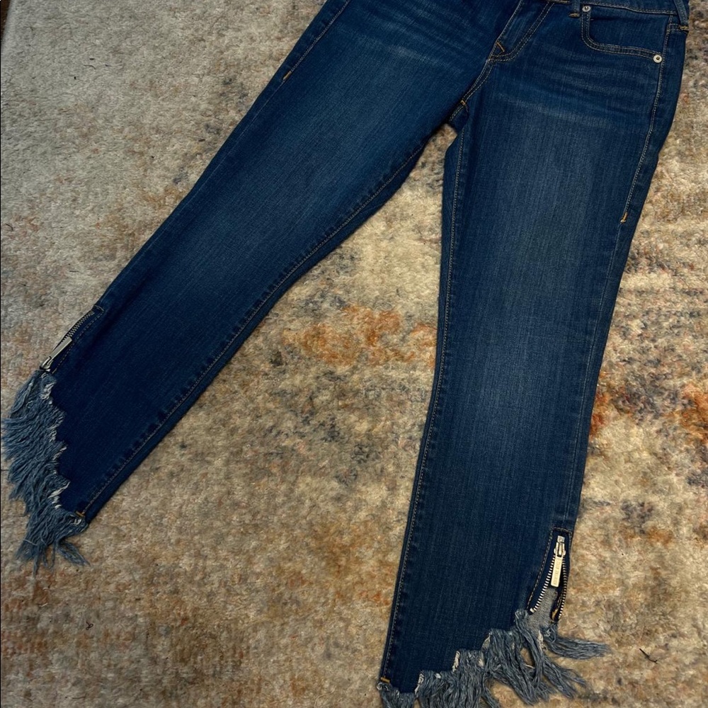 Mid rise fringed ankle length
